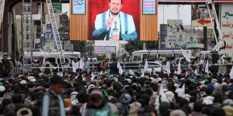 Houthi leader Abdul-Malik al-Houthi delivers a speech through a TV screen during a rally to mark the Ashura day in Sanaa, Yemen July 28, 2023. REUTERS/Khaled Abdullah